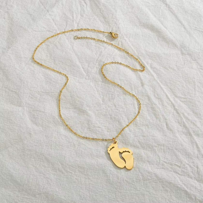 Lateefah Hot Selling Accessories Stainless Steel Laser Engraved Baby Name Necklace Pendant Simple Smooth Foot Jewelry