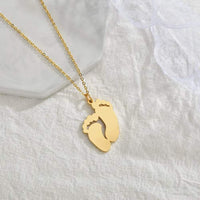 Lateefah Hot Selling Accessories Stainless Steel Laser Engraved Baby Name Necklace Pendant Simple Smooth Foot Jewelry