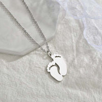 Lateefah Hot Selling Accessories Stainless Steel Laser Engraved Baby Name Necklace Pendant Simple Smooth Foot Jewelry
